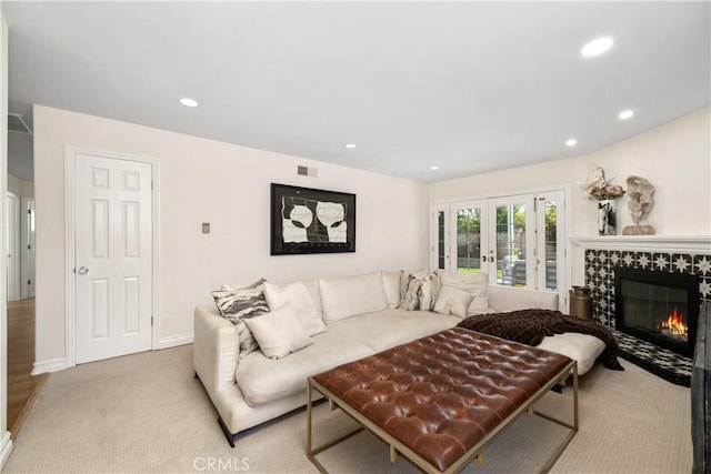 1614 Amelia Ave, San Pedro, CA 90731 - living room with carpet flooring, a tiled fireplace, recessed lighting, and baseboards