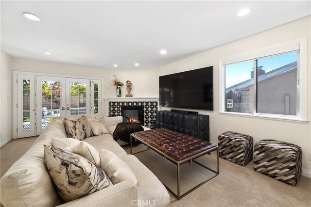 1614 Amelia Ave, San Pedro, CA 90731 - living room featuring carpet floors, french doors, plenty of natural light, recessed lighting, and baseboards