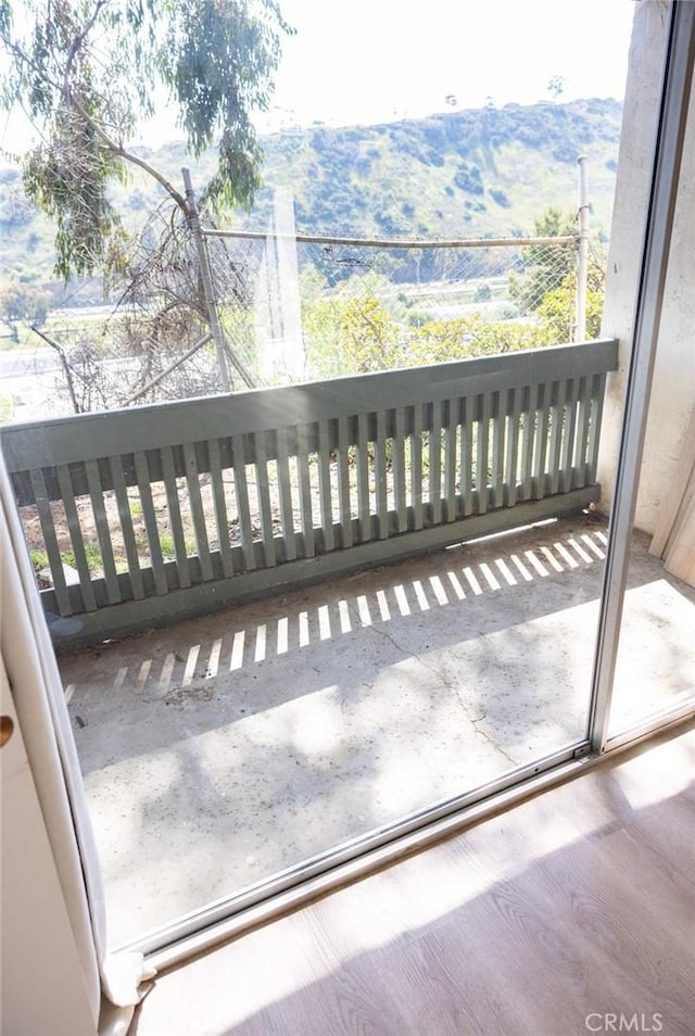 balcony featuring a mountain view