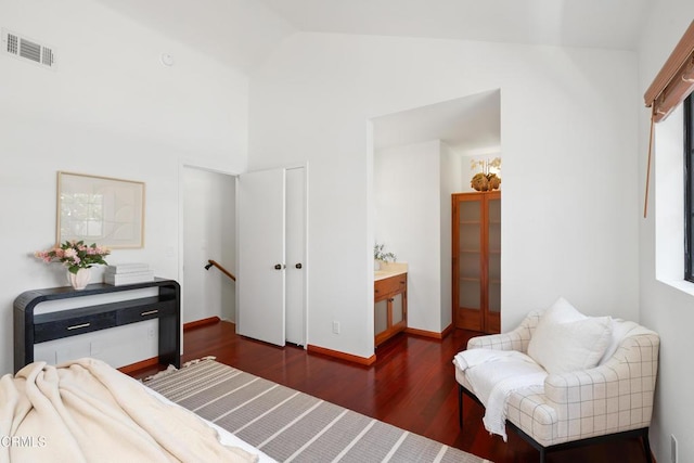 bedroom with multiple windows, high vaulted ceiling, baseboards, dark wood-type flooring, and visible vents