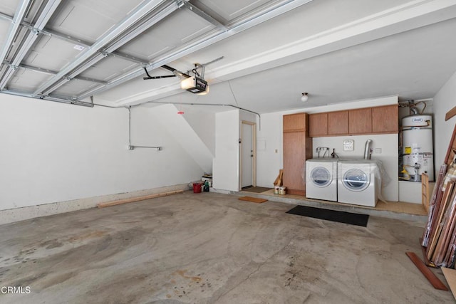 garage with water heater, a garage door opener, and washer and dryer