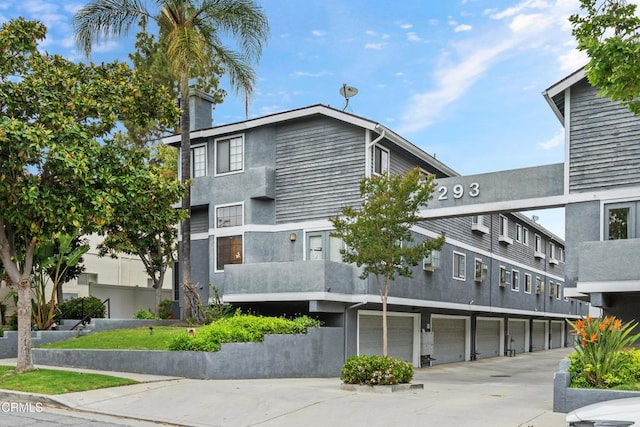 view of building exterior featuring a garage