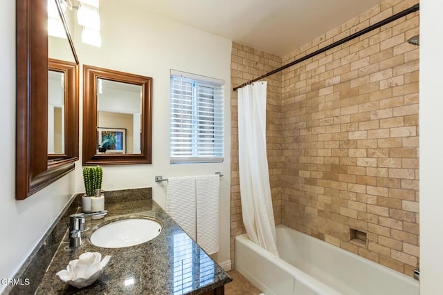 bathroom with vanity and shower / tub combo