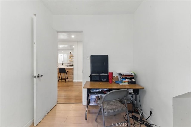 home office featuring recessed lighting and light tile patterned floors