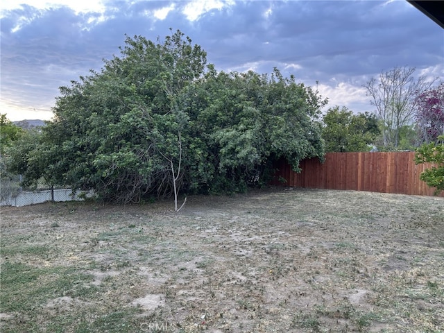view of yard featuring fence