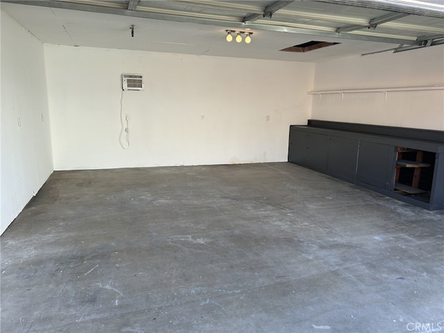 4832 Mitchell Ave, Riverside, CA 92505 - garage featuring a wall mounted AC