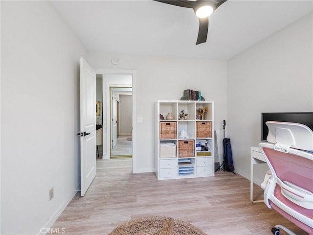 bedroom with light wood-type flooring, baseboards, and ceiling fan
