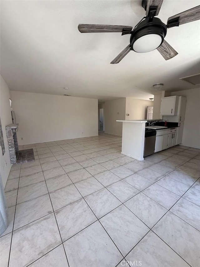10434 Peach Ct, Adelanto, CA 92301 - unfurnished living room with ceiling fan and light tile patterned floors
