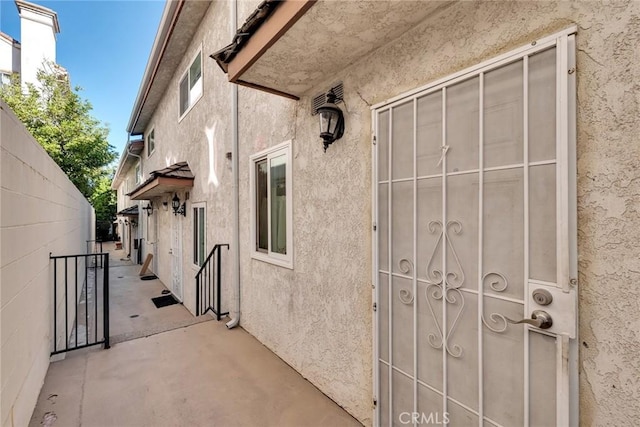 exterior space featuring a gate and fence