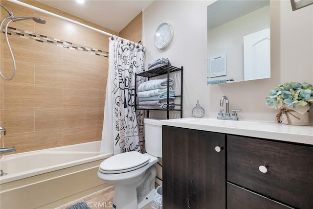 full bath featuring vanity, toilet, and shower / tub combo