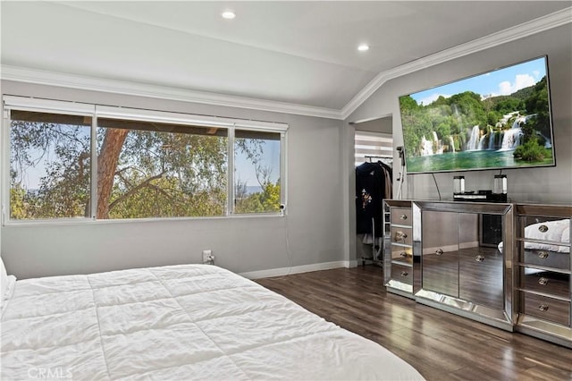 bedroom with crown molding, baseboards, dark wood finished floors, and lofted ceiling