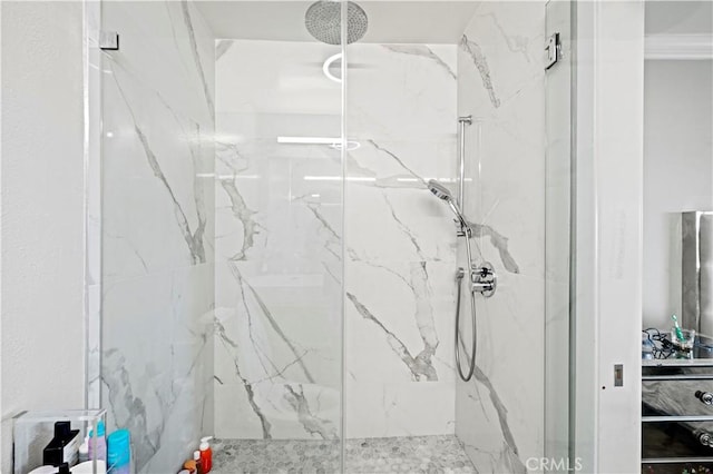 full bathroom with a marble finish shower