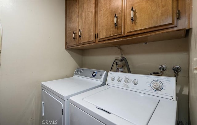 1411 Sequoia Dr, Lake Arrowhead, CA 92352 - laundry room with cabinet space and washing machine and clothes dryer