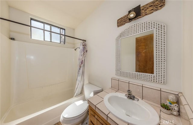 1411 Sequoia Dr, Lake Arrowhead, CA 92352 - bathroom featuring vanity, toilet, decorative backsplash, and shower / tub combo