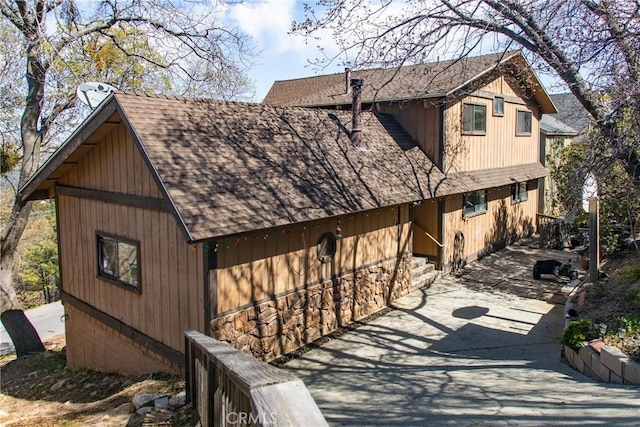 1411 Sequoia Dr, Lake Arrowhead, CA 92352 - view of property exterior featuring roof with shingles