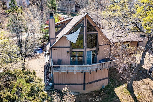 1411 Sequoia Dr, Lake Arrowhead, CA 92352 - back of house featuring a chimney