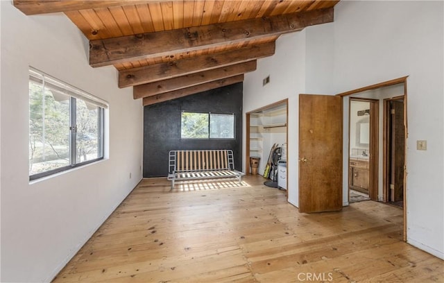 1411 Sequoia Dr, Lake Arrowhead, CA 92352 - unfurnished living room featuring wood ceiling, lofted ceiling with beams, light wood-style flooring, and visible vents