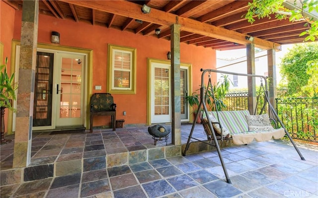 view of patio / terrace featuring fence