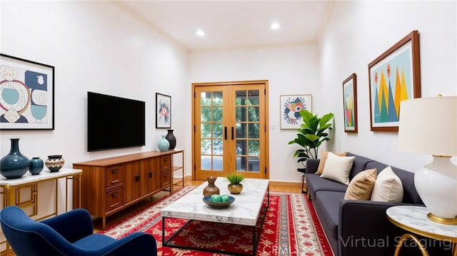 living area featuring french doors, recessed lighting, and wood finished floors