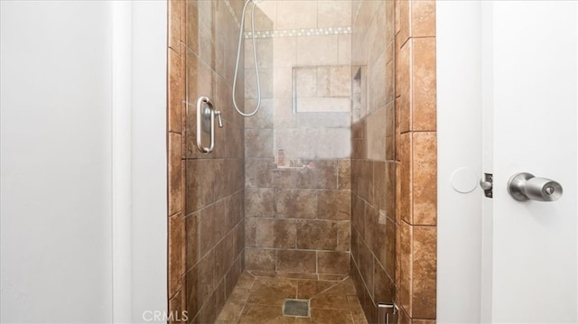 full bath featuring a stall shower