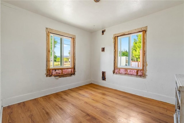 9235 Poplar St, Atascadero, CA 93422 - empty room with plenty of natural light and baseboards