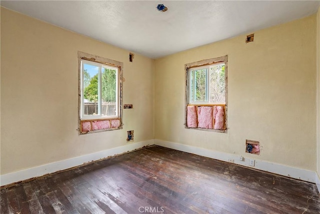 9235 Poplar St, Atascadero, CA 93422 - spare room featuring hardwood / wood-style floors, healthy amount of natural light, and baseboards