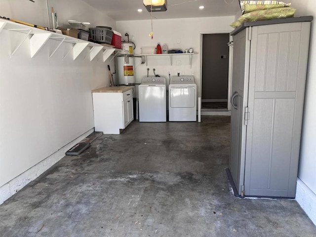 garage with separate washer and dryer, strapped water heater, a garage door opener, and recessed lighting