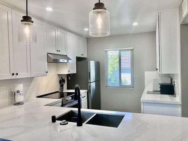 kitchen featuring electric range, recessed lighting, white cabinetry, under cabinet range hood, and light stone counters