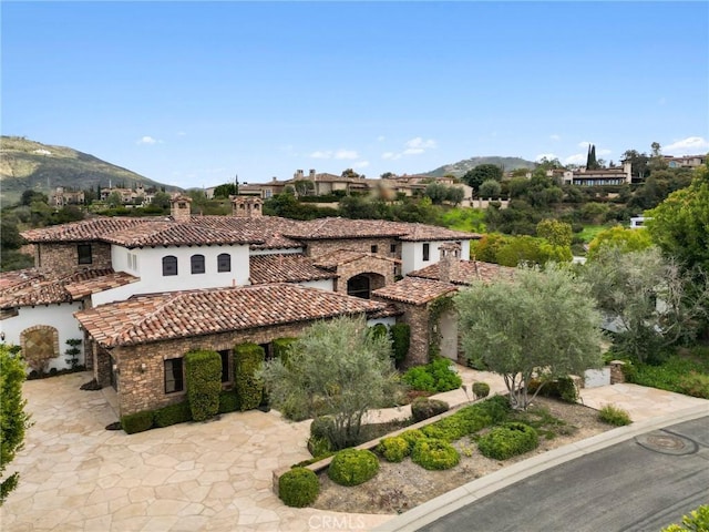 18441 Calle Tramonto, Rancho Santa Fe, CA 92091 - mediterranean / spanish house with a tile roof and a mountain view