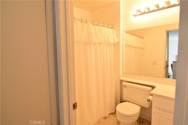 5727 E Stillwater Ave Unit 5, Orange, CA 92869 - full bathroom with tile patterned flooring, a shower with shower curtain, toilet, and vanity