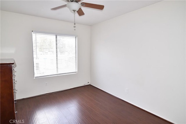 5727 E Stillwater Ave Unit 5, Orange, CA 92869 - unfurnished room with ceiling fan and dark wood-style floors