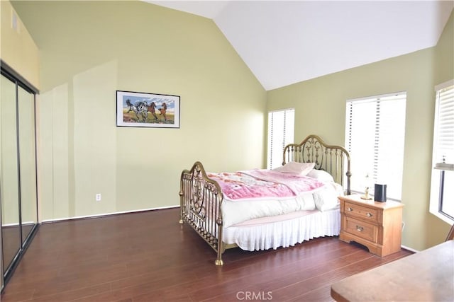 5727 E Stillwater Ave Unit 5, Orange, CA 92869 - bedroom with high vaulted ceiling and wood finished floors