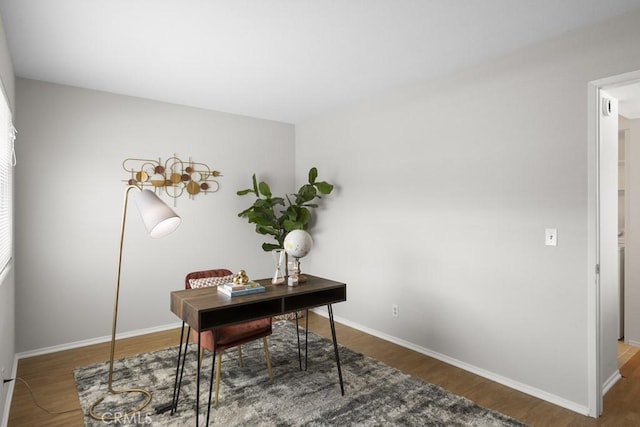 48668 Desert Flower Dr, Palm Desert, CA 92260 - home office with wood finished floors and baseboards