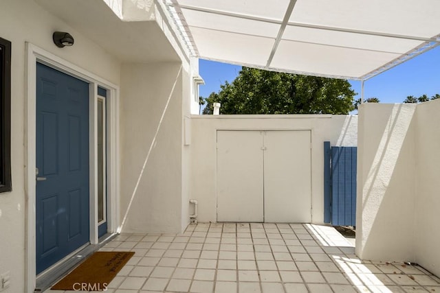 view of patio featuring fence