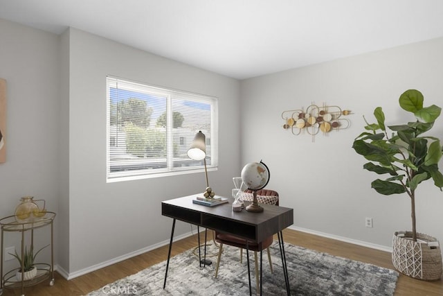 48668 Desert Flower Dr, Palm Desert, CA 92260 - home office with wood finished floors and baseboards