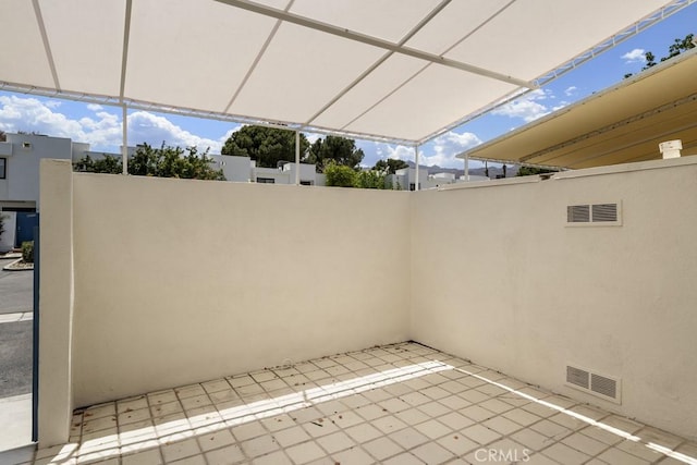 view of patio / terrace featuring visible vents