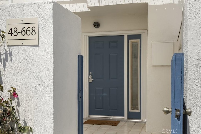 48668 Desert Flower Dr, Palm Desert, CA 92260 - entrance to property with stucco siding