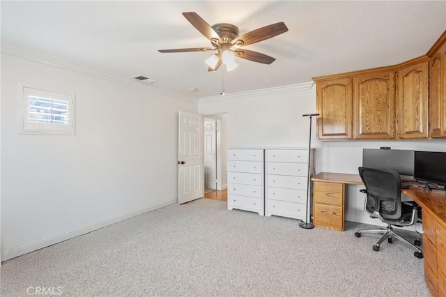 office featuring visible vents, crown molding, light carpet, baseboards, and a ceiling fan