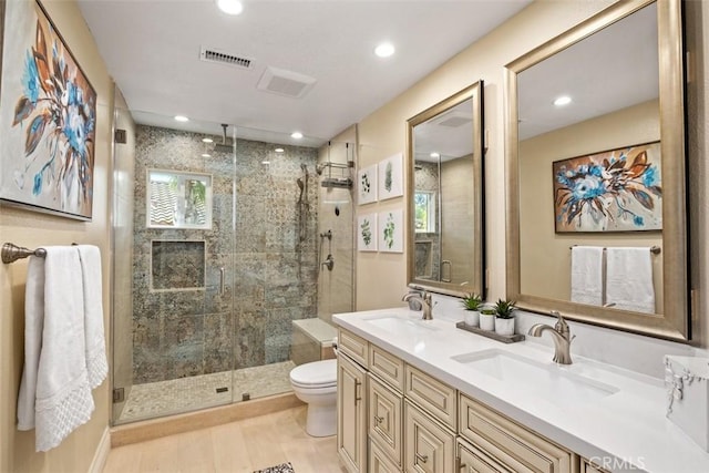 534 S Laureltree Dr, Anaheim Hills, CA 92808 - bathroom with a stall shower, recessed lighting, toilet, and double vanity