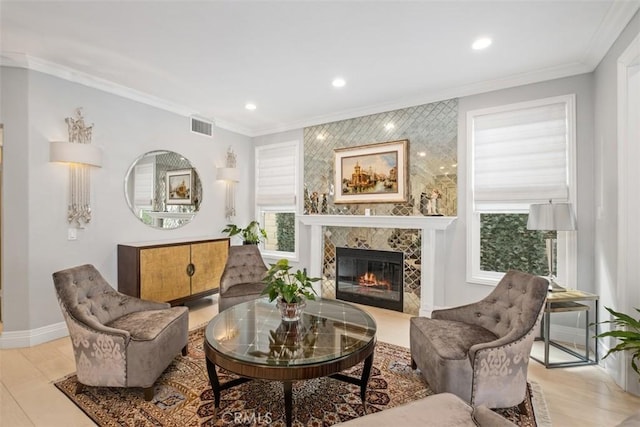534 S Laureltree Dr, Anaheim Hills, CA 92808 - living area with healthy amount of natural light, crown molding, a tile fireplace, baseboards, and recessed lighting