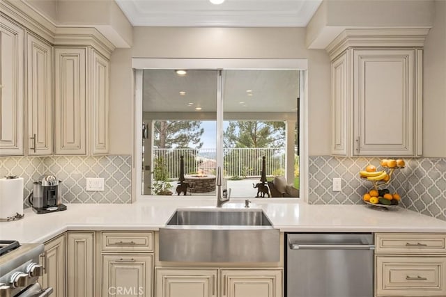 534 S Laureltree Dr, Anaheim Hills, CA 92808 - kitchen featuring cream cabinetry, a sink, appliances with stainless steel finishes, light countertops, and tasteful backsplash
