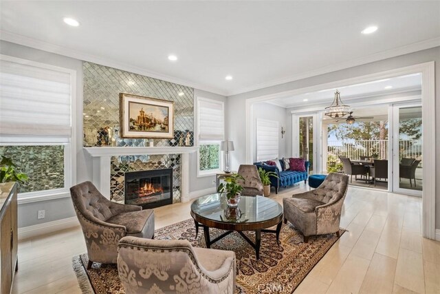 534 S Laureltree Dr, Anaheim Hills, CA 92808 - living area featuring ornamental molding, light wood-style flooring, recessed lighting, a high end fireplace, and baseboards