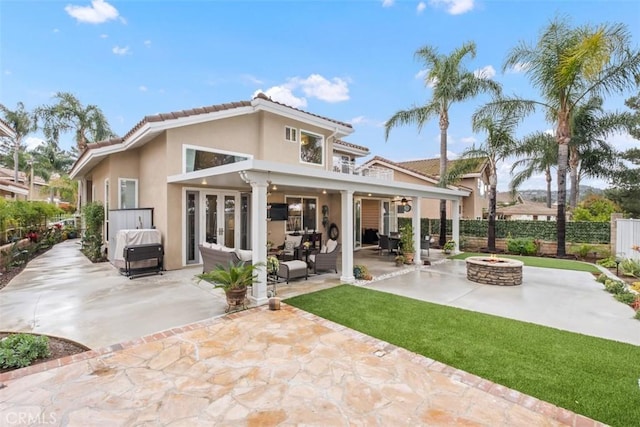 534 S Laureltree Dr, Anaheim Hills, CA 92808 - back of property featuring a patio, a fenced backyard, stucco siding, french doors, and a tiled roof