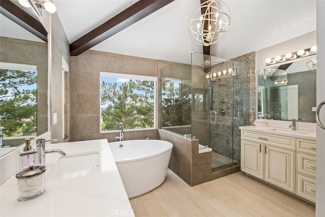 534 S Laureltree Dr, Anaheim Hills, CA 92808 - full bathroom featuring a stall shower, beamed ceiling, a soaking tub, vanity, and a chandelier