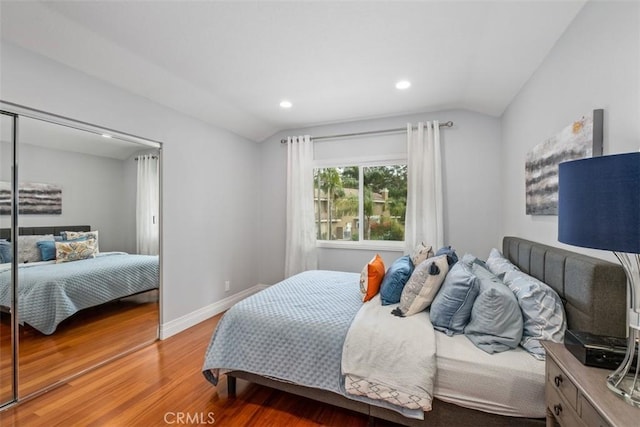 534 S Laureltree Dr, Anaheim Hills, CA 92808 - bedroom featuring vaulted ceiling, light wood-type flooring, recessed lighting, a closet, and baseboards