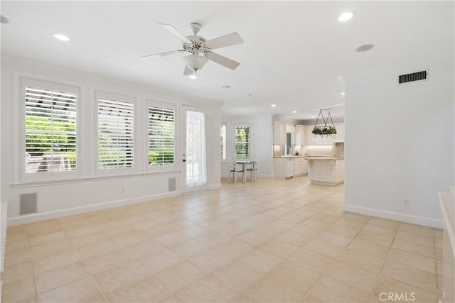 unfurnished living room featuring visible vents, baseboards, ceiling fan, recessed lighting, and light tile patterned floors