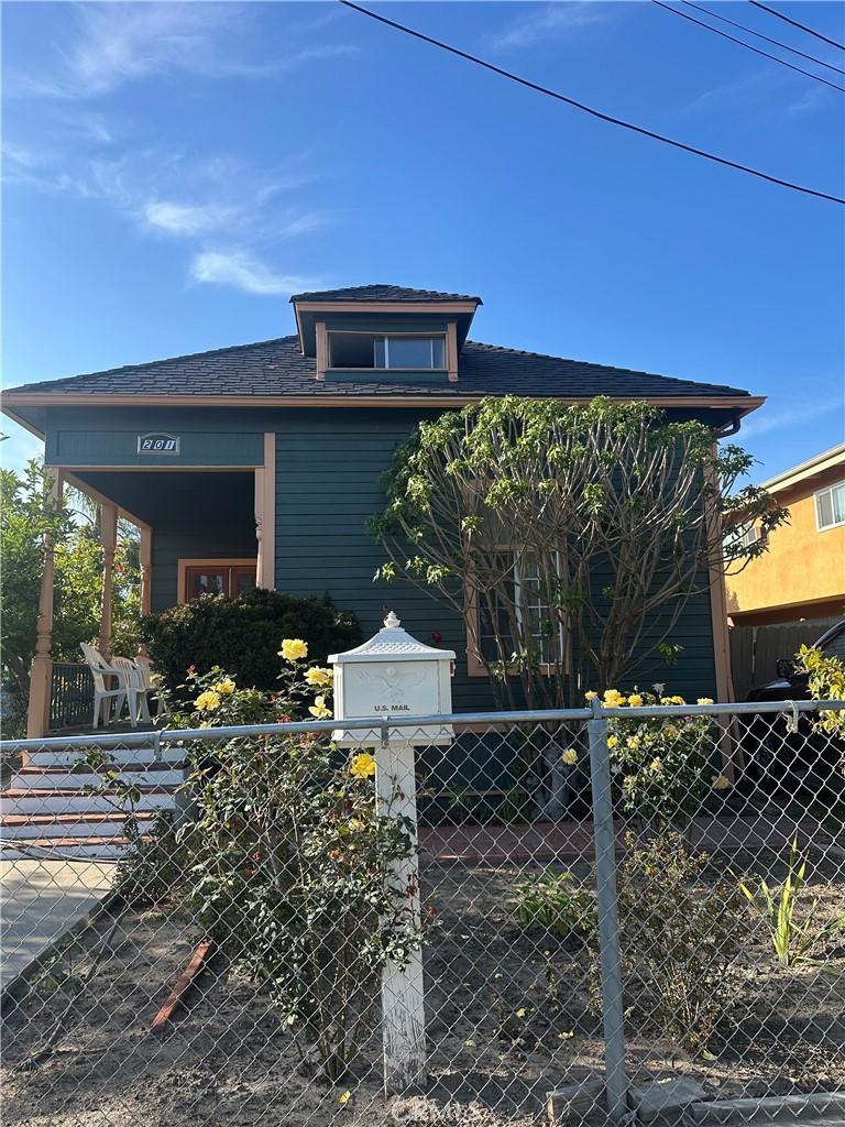 201 E Adele St, Anaheim, CA 92805 - view of front of property with covered porch and fence