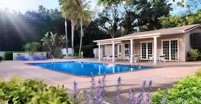909 Shady Ln, Glendora, CA 91740 - community pool featuring a patio and french doors