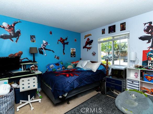 909 Shady Ln, Glendora, CA 91740 - bedroom featuring carpet flooring and a textured ceiling