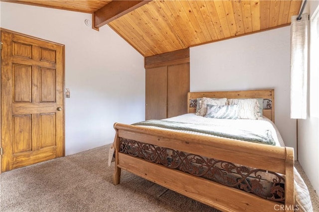 carpeted bedroom with lofted ceiling with beams and wood ceiling
